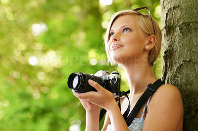 Buy stock photo Happy, woman and photographer in nature with trees, camera and vacation in environment. Forest, park and girl filming with natural happiness outdoor on summer holiday, trip or travel with technology