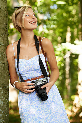 Buy stock photo Happy, nature and photographer with woman in forest for relax, memory or travel photography. Summer, trees and adventure with female person with camera for vacation, holiday and environmental tourism