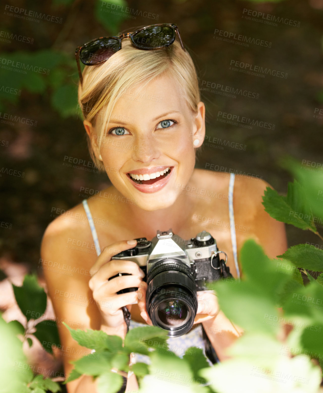 Buy stock photo Happy, portrait and photographer with woman in forest for relax, memory and travel photography. Summer, trees and adventure with person and camera for vacation, holiday and environmental tourism