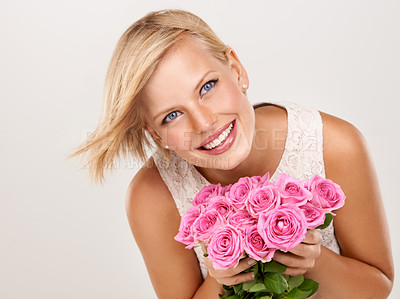 Buy stock photo Flowers, wedding and smile with woman in studio for floral, valentines day and romance. Bouquet, gift and happy with female person and pink roses on white background for elegant, love and present 