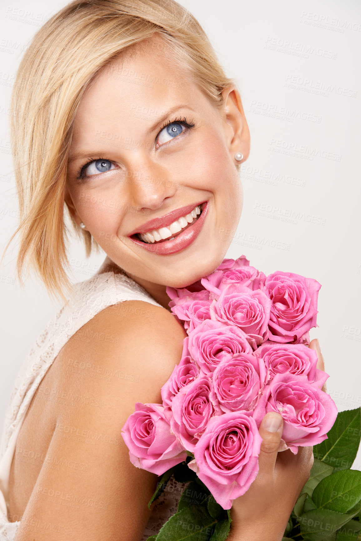Buy stock photo Thinking, pink roses or woman with flowers for beauty, natural skincare or wellness on white background. Ideas, glow or happy model with smile, valentines day gift or bouquet for a present in studio