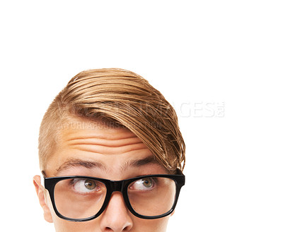 Buy stock photo Glasses, thinking and young man in a studio with choice, looking or decision facial expression. Optometry, idea and half face of male person with spectacles or eyewear isolated by white background.