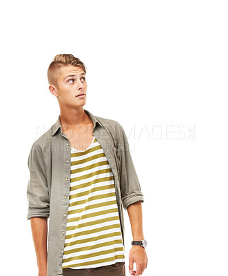 Buy stock photo Young man, thinking and looking up on mockup isolated against a white studio background. Face of handsome male person, hipster or model standing in surprise, wonder or idea in casual style fashion
