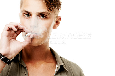 Buy stock photo Portrait, space or man smoking a cigarette for stress, toxic addiction or unhealthy habit to relax. Dangerous, smoker or male person in Germany to inhale tobacco on white background or studio mockup