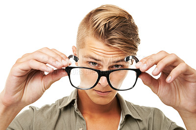 Buy stock photo Perspective, portrait and a man with glasses on a white background for vision, eye care or test. Fashion, face and a person showing eyewear for lens, frame or optometry exam on a studio backdrop