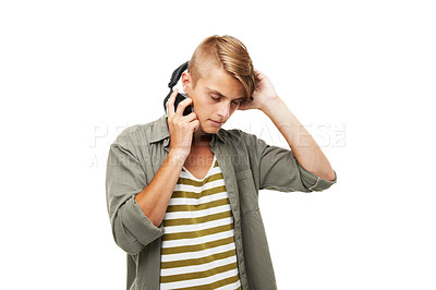 Buy stock photo Man, DJ and headphones for audio streaming or listening to music against a studio background. Young male person or sound artist with headset for podcast, rhythm beat or radio track on mockup space