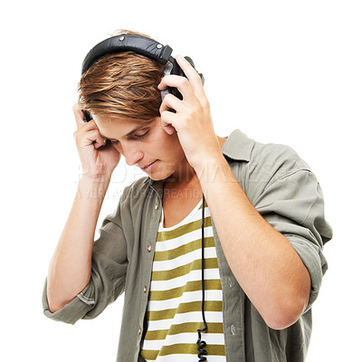 Buy stock photo Man, headset and listening to music for podcast, audio streaming or DJ against a white studio background. Male person or sound artist with headphones for beats, songs or playlist on mockup space