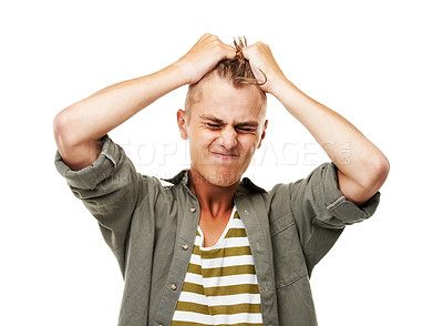 Buy stock photo Frustrated, man and pulling hair in anger, stress or anxiety for mistake, fail or crisis in college. Studio, university student and angry from loss of work, burnout or disaster in white background