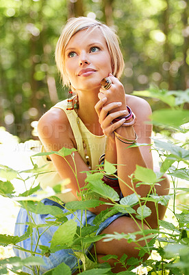 Buy stock photo Woman, garden and plant with thinking, relax and calm outdoor in a forest with smile. Female person, grass and nature in summer with vacation and holiday with green woods with an idea in the sun
