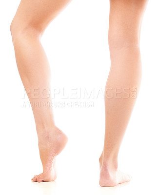 Buy stock photo Skincare, beauty and legs of person on a white background for grooming, waxing and wellness. Dermatology, salon aesthetic and isolated feet for smooth skin, spa treatment and epilation in studio