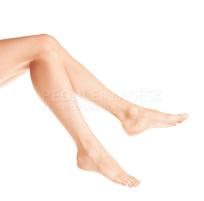 Buy stock photo Closeup of a young woman's legs against a white background
