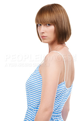 Buy stock photo A beautiful young woman looking over her shoulder with a serious expression
