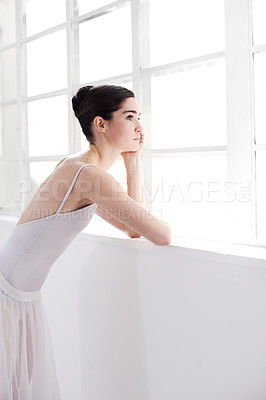 Buy stock photo Woman, ballerina and thinking by window in ballet for dance, vision or doubt in the art studio. Female person or dancer looking out glass in decision, think or dream with dancing costume indoors
