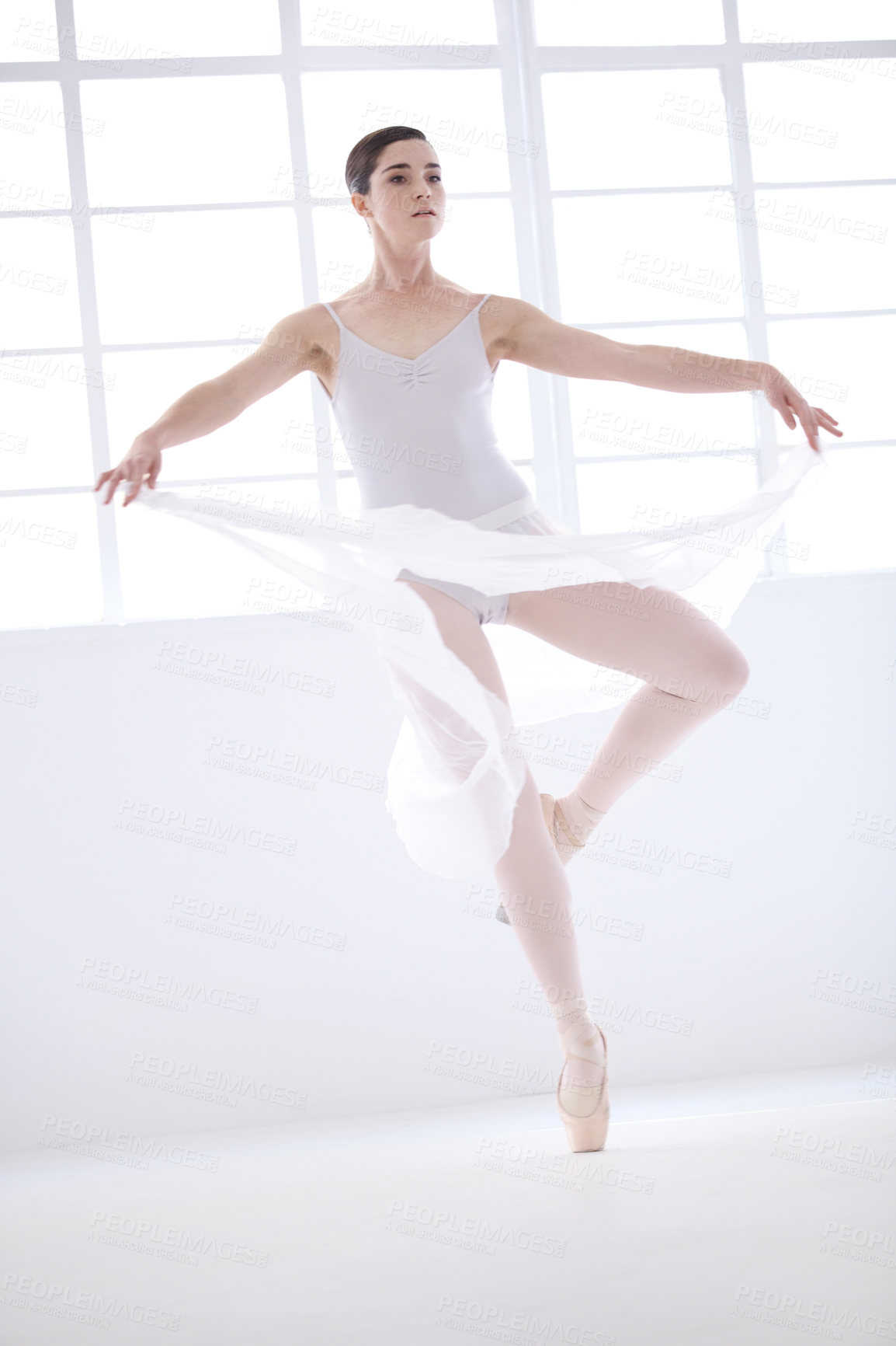 Buy stock photo Dance, ballet and art with woman in studio for balance, elegant and performance. Creative, theatre and training with female ballerina dancing in class for competition, freedom and commitment