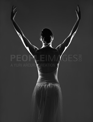 Buy stock photo Creative, silhouette and back of a ballerina in a studio with elegant posture, pose or position. Art, monochrome and female ballet dancer doing a classical dance or performance by a black background.