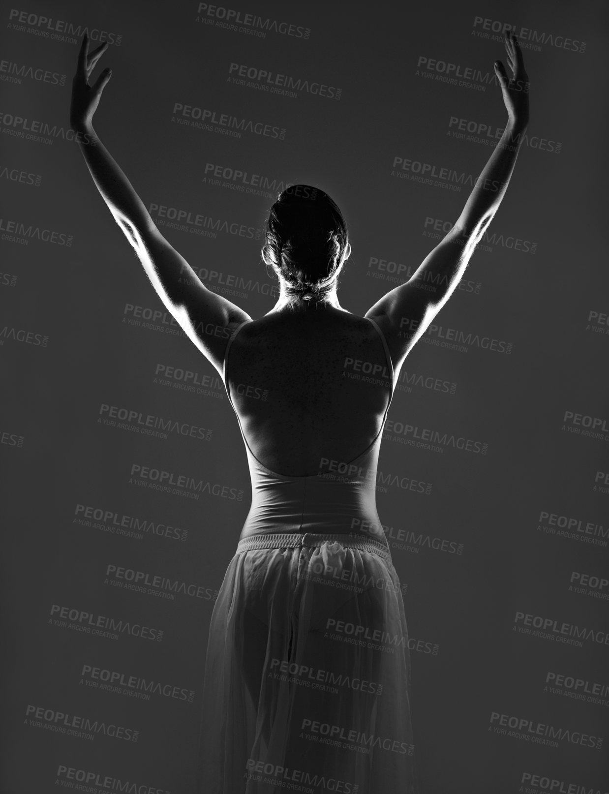 Buy stock photo Creative, silhouette and back of a ballerina in a studio with elegant posture, pose or position. Art, monochrome and female ballet dancer doing a classical dance or performance by a black background.