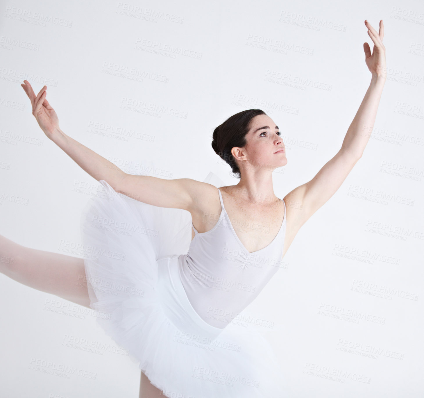 Buy stock photo Music, dance and ballet with a woman in studio on a white background for rehearsal or recital for theatre performance. Art, creative and focus with a young female ballerina or dancer in uniform