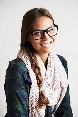 Buy stock photo A young woman smiling at the camera against a white background