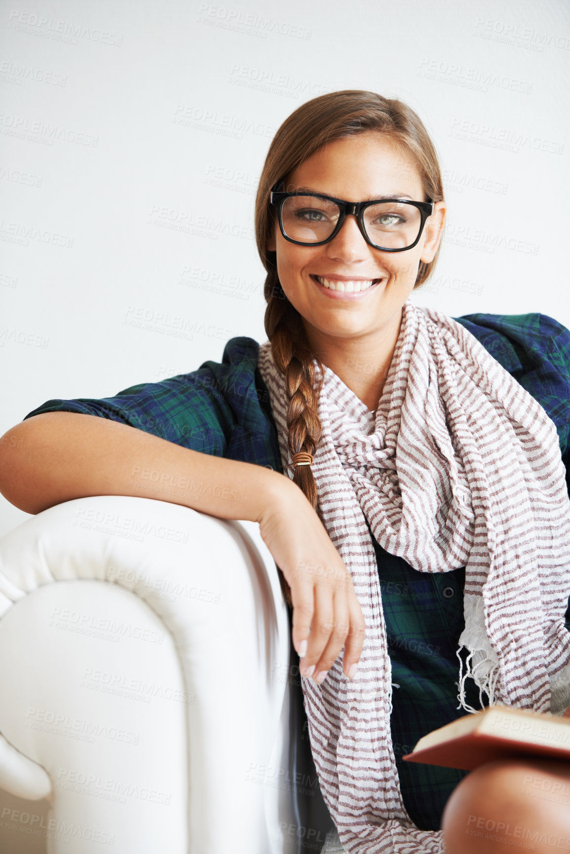 Buy stock photo Portrait, smile and woman in glasses on sofa for fashion in living room of home or apartment. Face, eyewear and confident girl in lounge relax on couch in style, cool clothes or scarf in Switzerland