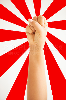 Buy stock photo Hand in air, fist up in protest in studio isolated on a red and white background for freedom, human rights and justice, equality and sign. Arm, closeup and fight for revolution, power and violence.