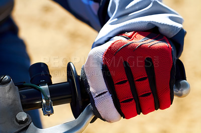 Buy stock photo Closeup of a dirt biker's hand wearing a glove