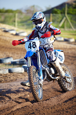 Buy stock photo Person, motorcycle and dirt race track adventure as 
professional in action, danger or fearless risk. Bike rider, off road course and fast speed competition rally, extreme sport gear on sand path