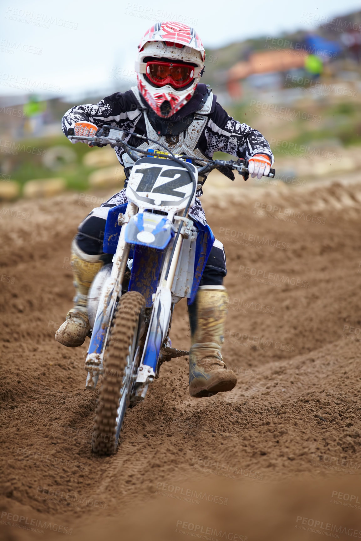 Buy stock photo Motorcross, dirt road and athlete riding bike with speed for a race or sports competition. Challenge, fitness and man biker on motorcycle for adrenaline, training or practicing on outdoor mud trail.

