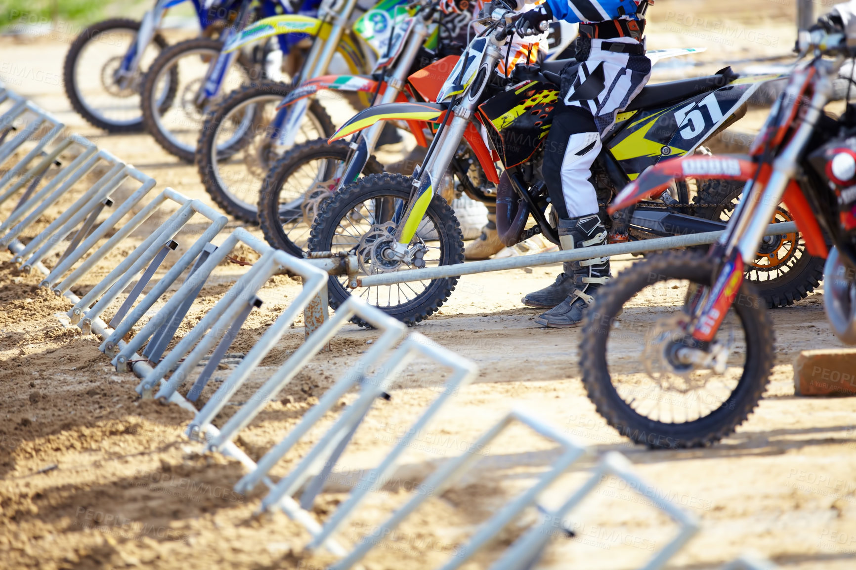 Buy stock photo Bike, parking and closeup of man biker waiting to ride for training, race or competition with action. Sports, fitness and zoom of male athlete on a motorcycle for adventure at a rally with freedom.