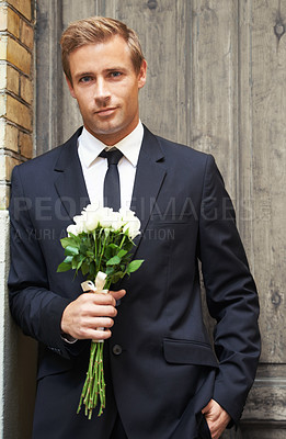 Buy stock photo Portrait, front door and man with flowers for valentines day, romance or gesture while standing outside. Roses, face or gentleman and bouquet on first date, love or anniversary, confident or handsome