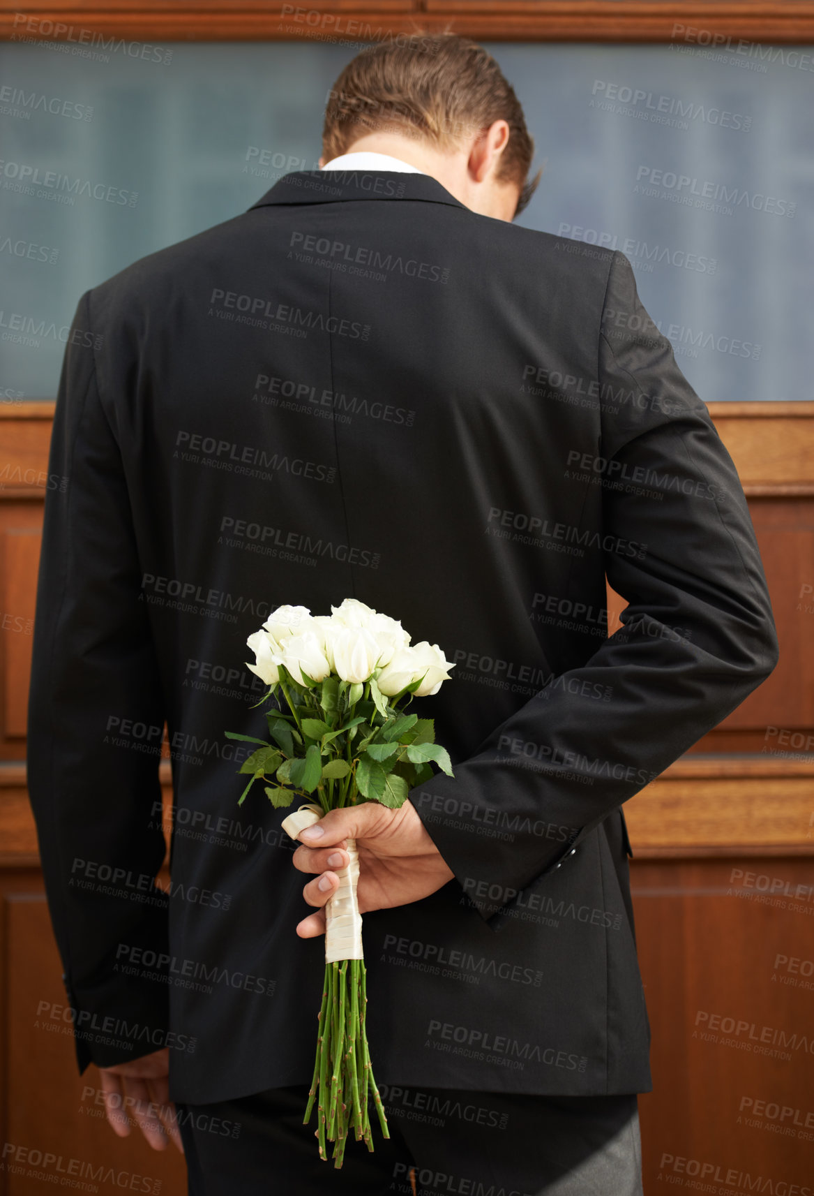 Buy stock photo Love, romance and man with flowers for a surprise for valentines day, wedding or anniversary. Gift, floral and back of guy in a suit or tuxedo with bouquet of white roses to celebrate romantic event.