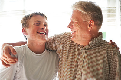 Buy stock photo Senior man, boy and laugh with smile, happy and embrace with love, grandchild and joy. Grandparent, support or bonding together for relationship, family and hug with teenager, house or grandfather