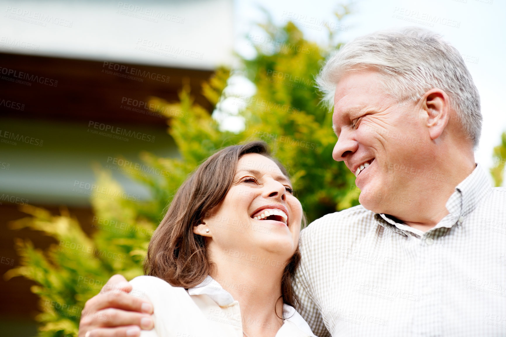 Buy stock photo Senior couple, laugh and happiness with embrace, marriage and smile, outdoor and summer. Retirement, elderly or love for commitment, bonding together or care for romantic relationship, man or woman
