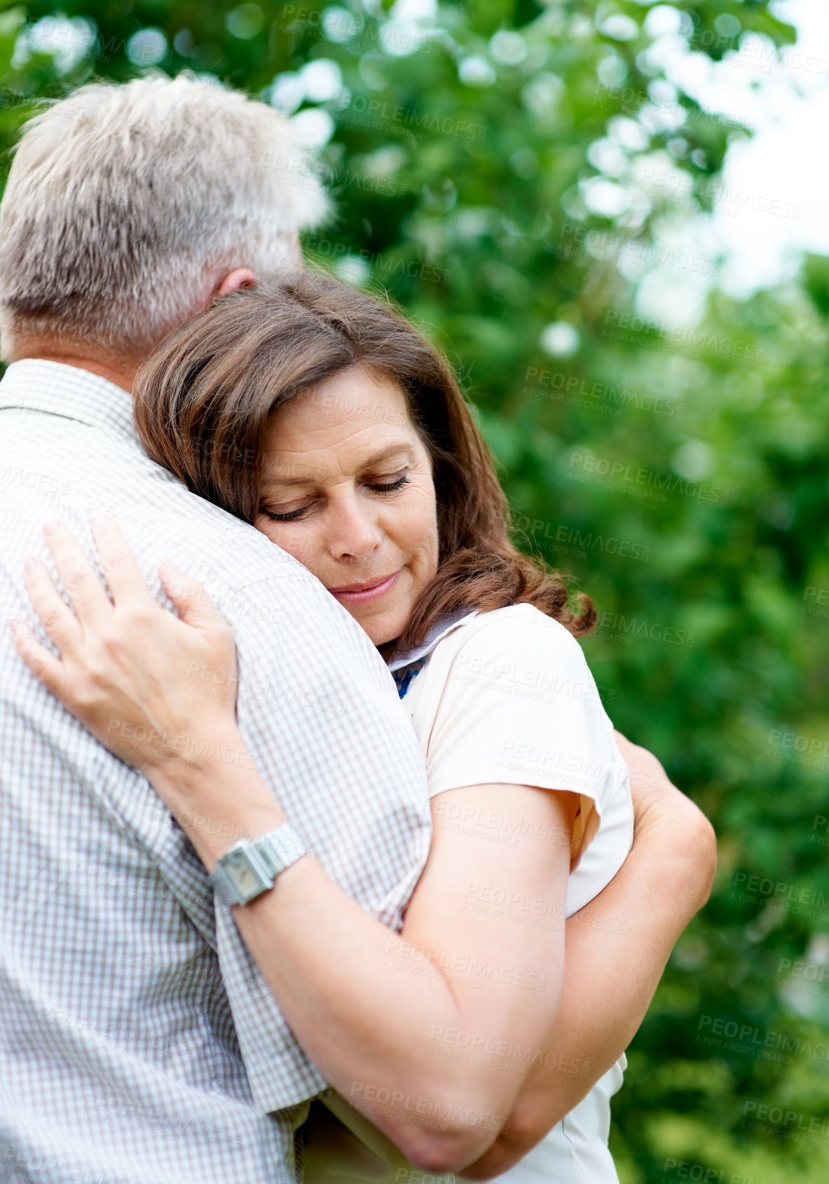 Buy stock photo Senior couple, support and eyes closed with hug, marriage and embrace in outdoor, trust and retired. Retirement, elderly and love in park, bonding and care for romantic relationship, man and woman
