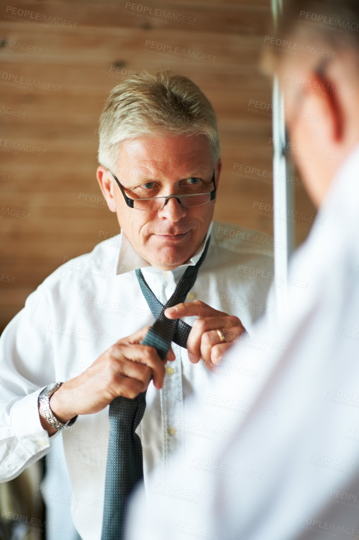 Buy stock photo Mature man with mirror, tie and shirt for work in morning in apartment with glasses, clothes and confidence. Face, reflection and professional senior businessman in home getting ready for office.