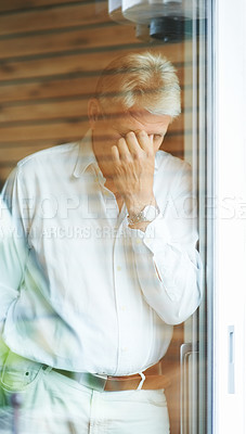 Buy stock photo Mature man at window, thinking and stress in home with doubt, anxiety for decision and lonely memory. Sad, worry and worried senior person with insight, reflection and ideas for retirement in bedroom