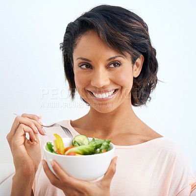 Buy stock photo Smile, health and woman with a salad in studio with vegetables for wellness, organic or diet. Happy, nutrition and young female person from Mexico eating healthy meal with produce by white background