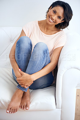 Buy stock photo Fashion, smile and portrait of woman on sofa with casual, trendy and stylish outfit in living room. Happy, positive and young female person from Mexico with cool style relaxing in the lounge at home.