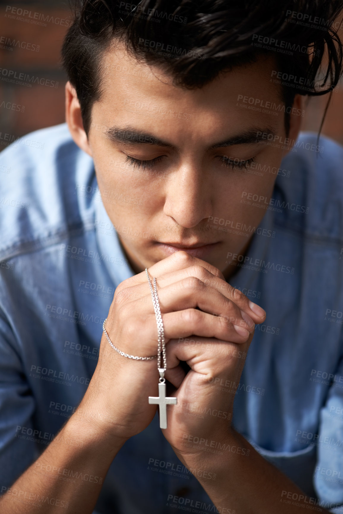 Buy stock photo Man, hands and praying with crucifix for faith, worship and spirituality for soul, support and belief. Male person, confession and hope for forgiveness from god, gratitude and trust in religion