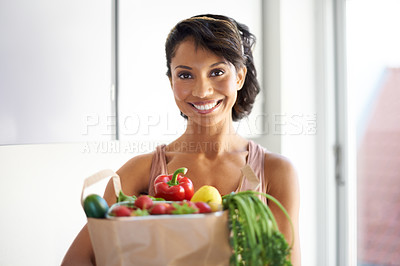 Buy stock photo Happy woman, portrait and shopping bag in kitchen with groceries, vegetables or fresh produce at home. Female person, shopper or vegan smile with food from grocery for salad or healthy diet at house