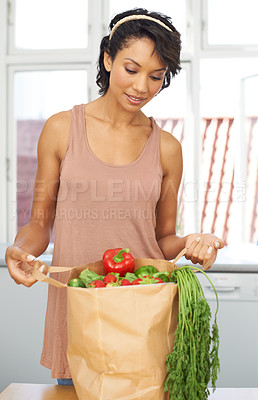 Buy stock photo Kitchen, vegetables and woman with groceries, healthy food and wellness with retail, package and customer. Person, client and girl with nutrition, home and meal with brown bag, thinking and diet 