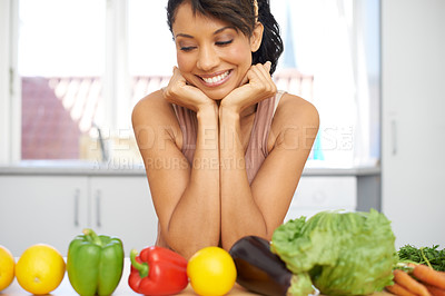 Buy stock photo Happy woman, vegetables and line in kitchen for meal preparation, fresh produce or diet at home. Female person or vegan smile for natural organic food, row or nutrition in health or wellness at house