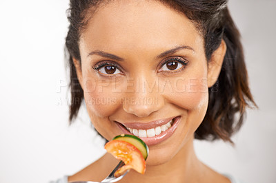 Buy stock photo Happy woman, portrait and vegetable salad for diet, snack or natural nutrition against a studio background. Closeup of female person smile and eating organic food for fiber, vitamins or healthy meal
