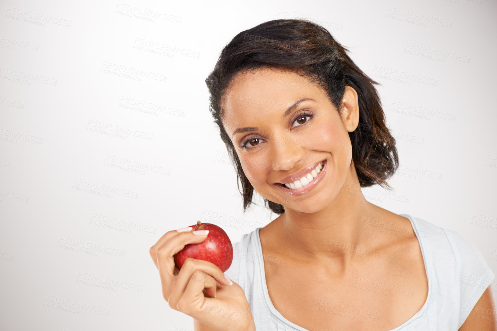 Buy stock photo Happy woman, portrait and apple for health diet, snack or natural nutrition against a studio background. Face of female person or model smile with red organic fruit for fiber, vitamin or healthy meal