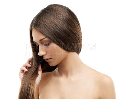 Buy stock photo A beautiful young woman with luxurious hair isolated on a white background
