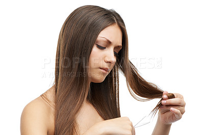 Buy stock photo Woman, alone and scissor for hair in studio with mock up for treatment on white background in Russia. Female model, serious or concentration on face for damage, split ends or care for growth in space