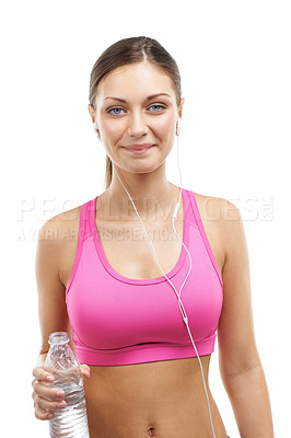 Buy stock photo Fitness, music and portrait of woman with water on a white background for workout, exercise and training. Listening to audio, earphones and person with bottle for sport, wellness and health in studio