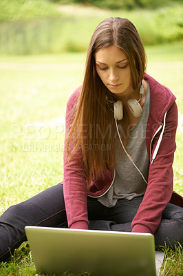 Buy stock photo Woman in park with laptop to study for university, internet connection and website for school project. Relax, computer and college student on grass in campus garden for research, technology and peace