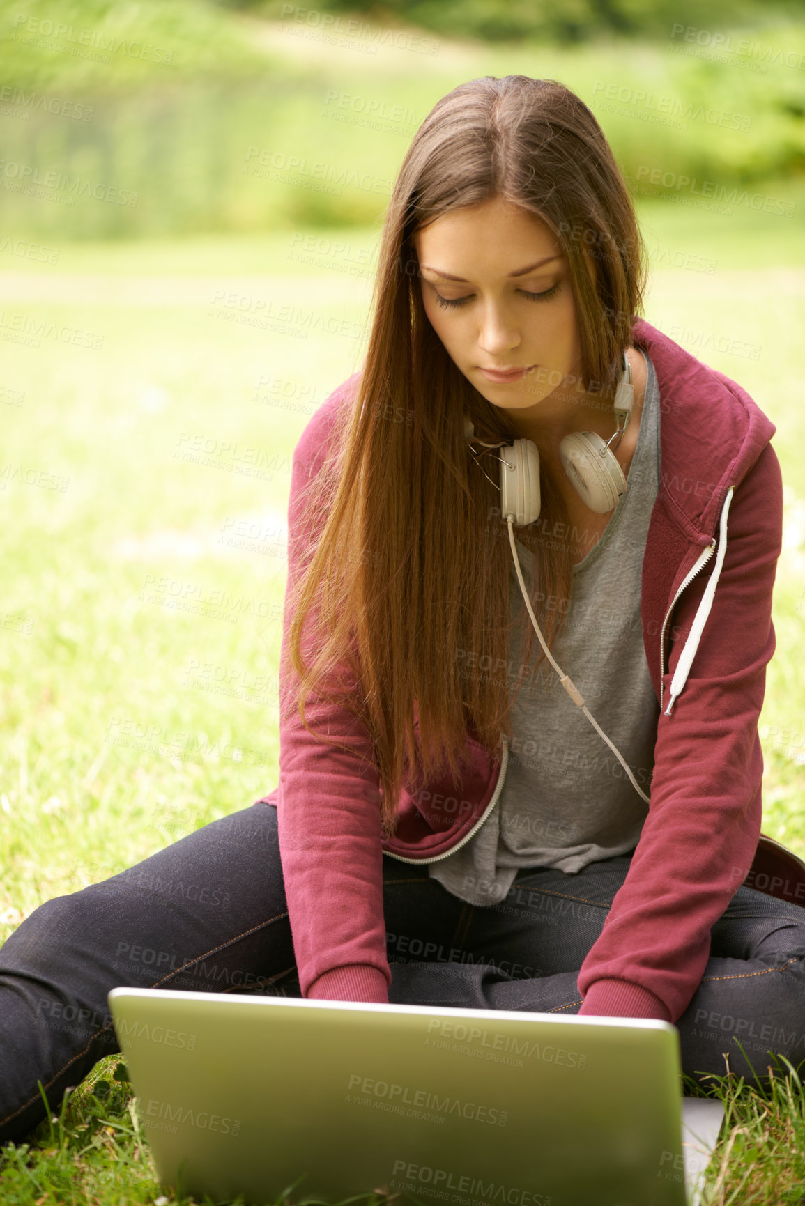 Buy stock photo Woman in park with laptop to study for university, internet connection and website for school project. Relax, computer and college student on grass in campus garden for research, technology and peace