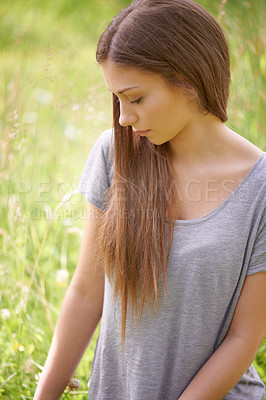 Buy stock photo Thinking, grass and woman relax in field for reflection, memories and thought on summer weekend. Nature, countryside and person sitting in meadow for calm, peace and fresh air on holiday or vacation