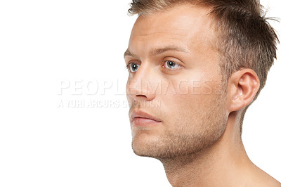 Buy stock photo Studio shot of a young man isolated on white